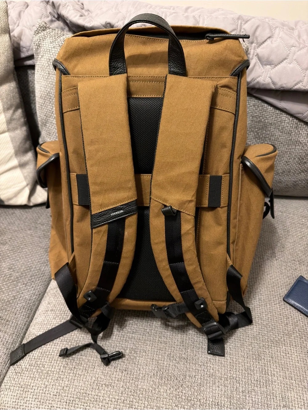 Men's Tan Canvas Travel Backpack with Black Trim